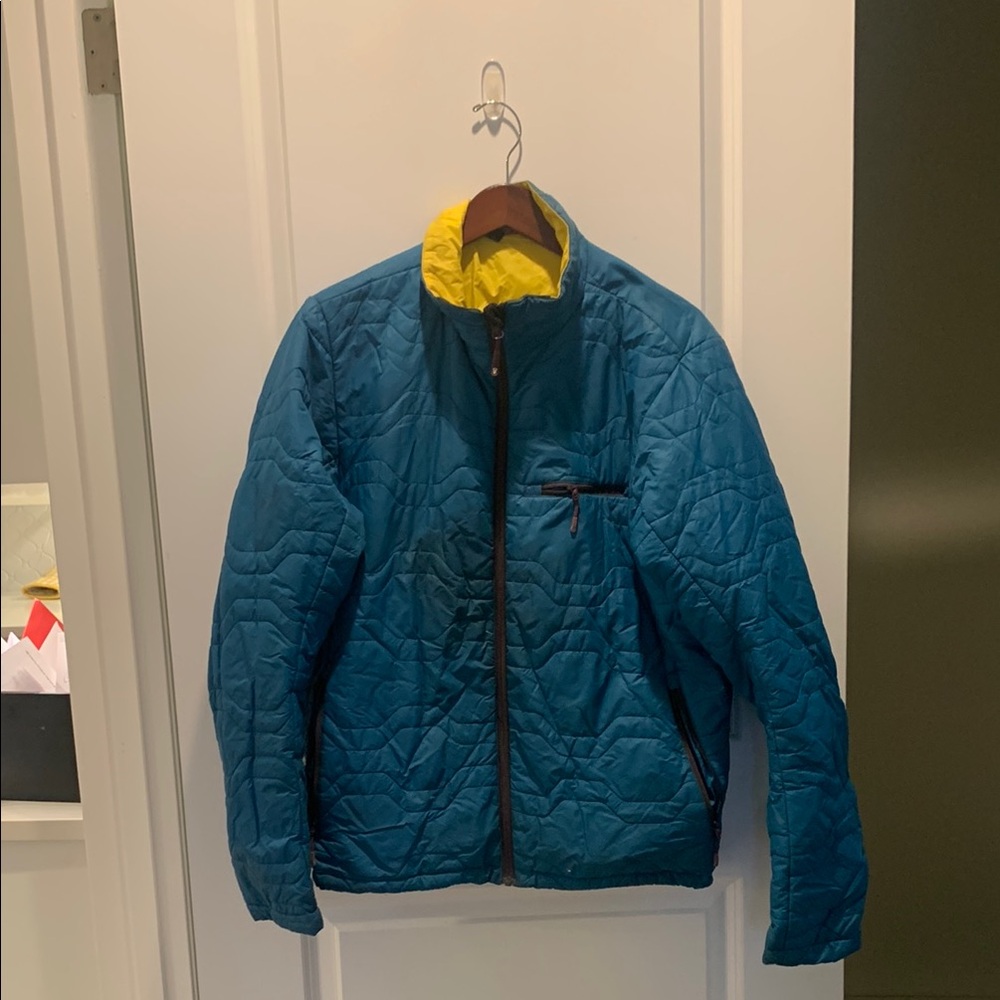 Teal mid-weight jacket used but still has lots of life left